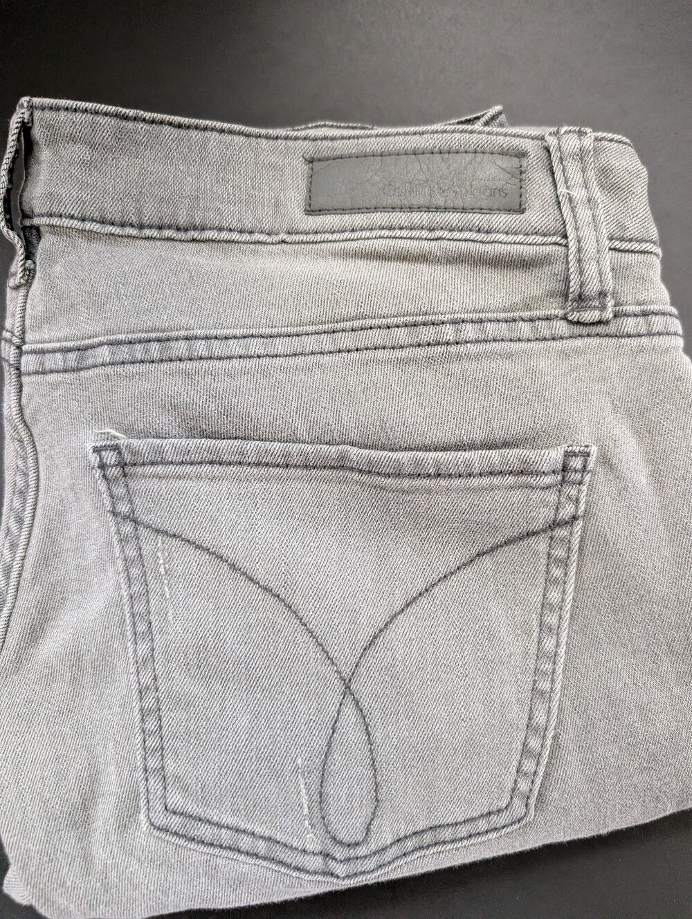 Calvin Klein Gray Women’s Distressed Jeans with Back Pocket Detail